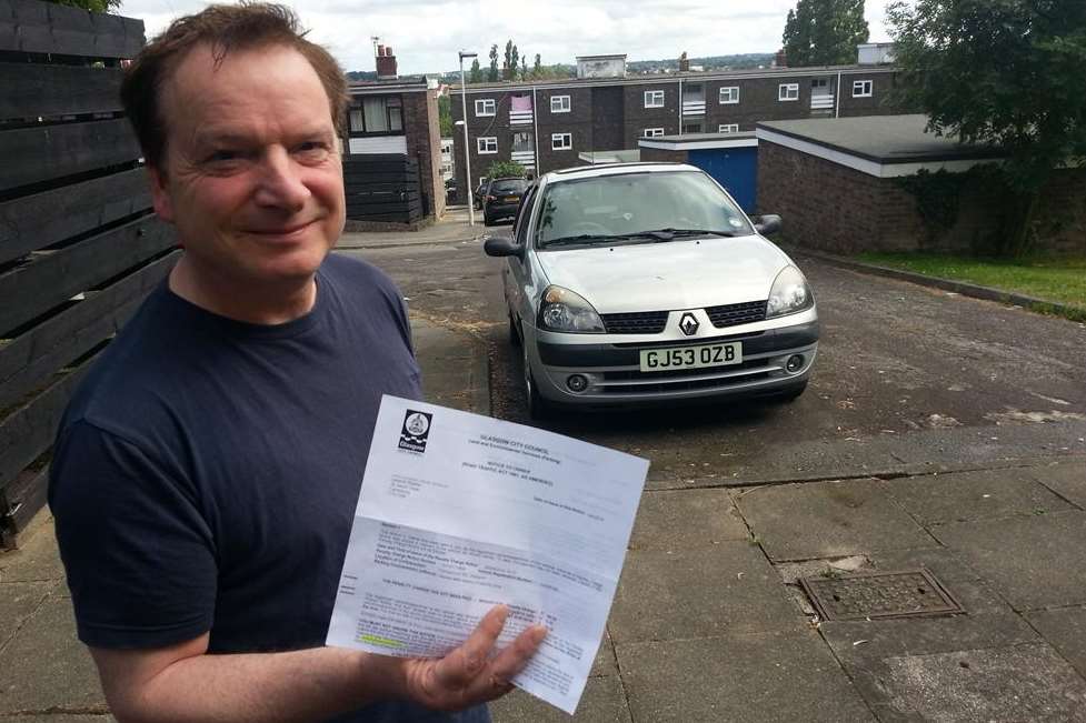 Leopold Slayter from Canterbury with his parking ticket from Glasgow - even though he's never been there