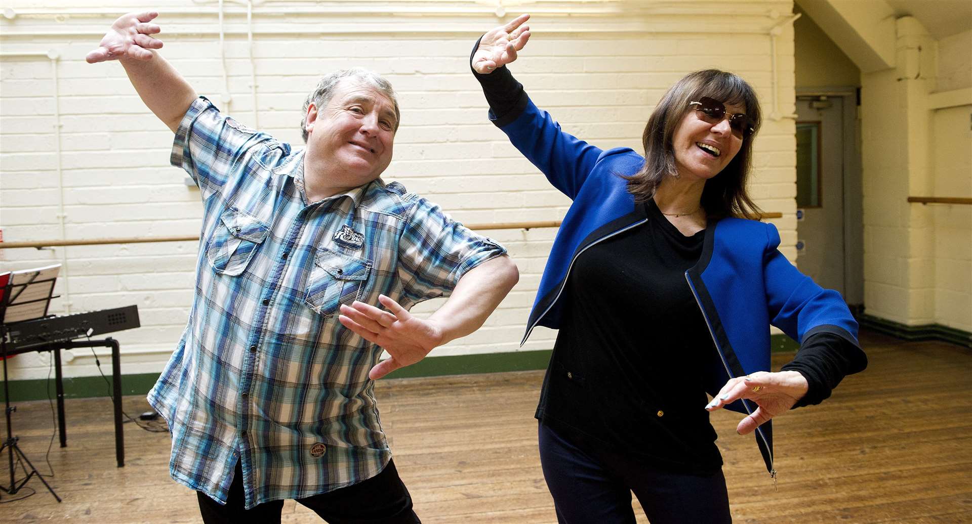 Russell Grant rehearsing with Arlene Phillips for his role as Teen Angel in Grease in 2012. Picture: Tristram Kenton