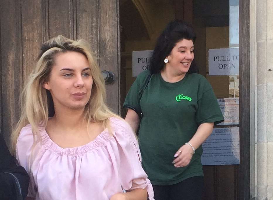 Sarah Drinkwater, in pink, leaves court with her mother, Fiona Brown, in green.
