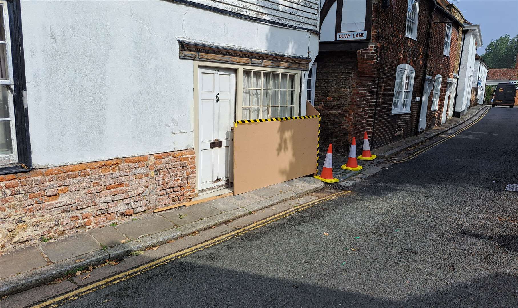 The house in Sandwich is boarded up after a crash yesterday