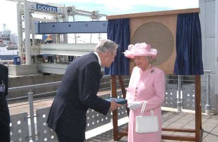 The Queen receives the first copy of a specially-commissioned book recording the port's royal history from chairman of Dover Harbour Board Robert Dibble. Picture: PAUL AMOS