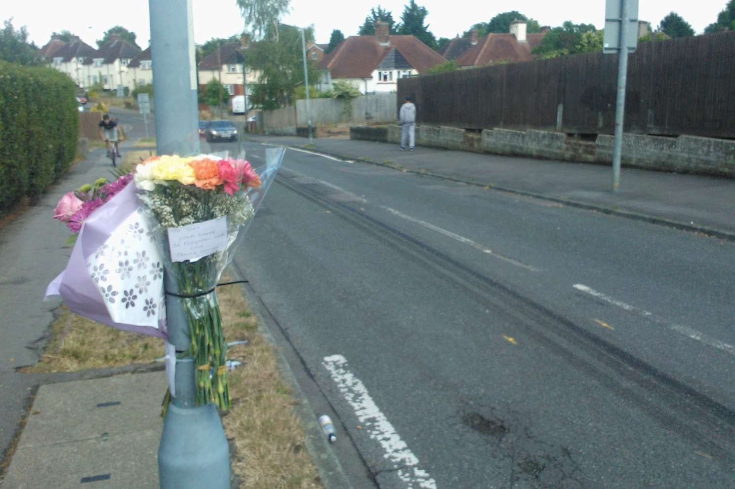 Flowers left at the scene in Lynden Way