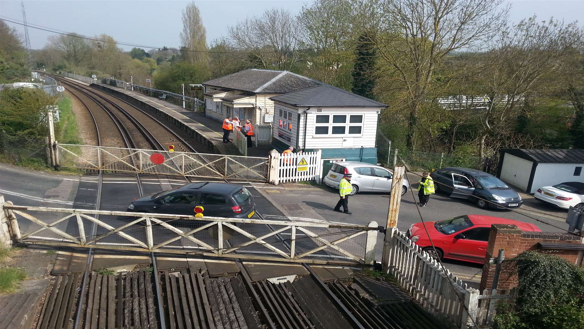 Police remain at the level crossing at East Farleigh