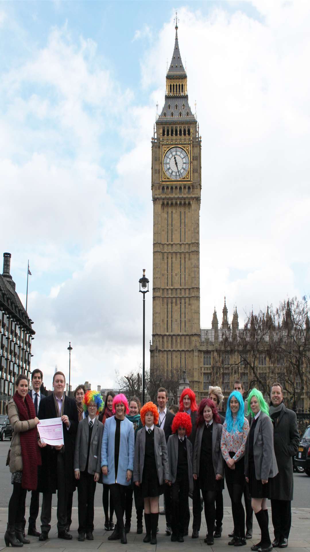 Folkestone Academy wig wigglers outside the Houses of Parliament and Big Ben for CLIC Sargent fundraiser. Picture: CLIC Sargent
