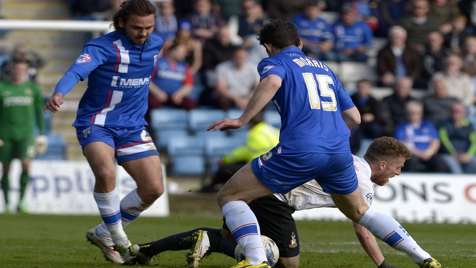 Aaron Morris and Bradley Dack get stuck in against Bradford Picture: Barry Goodwin