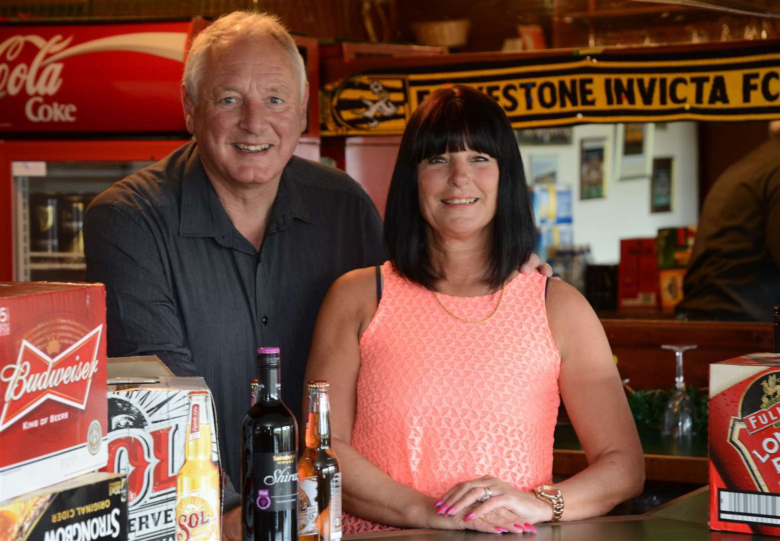 Pauline Cugley, pictured with husband Neil, will be giving up her role behind the bar at Folkestone officially after this Saturday's match. Picture: Gary Browne