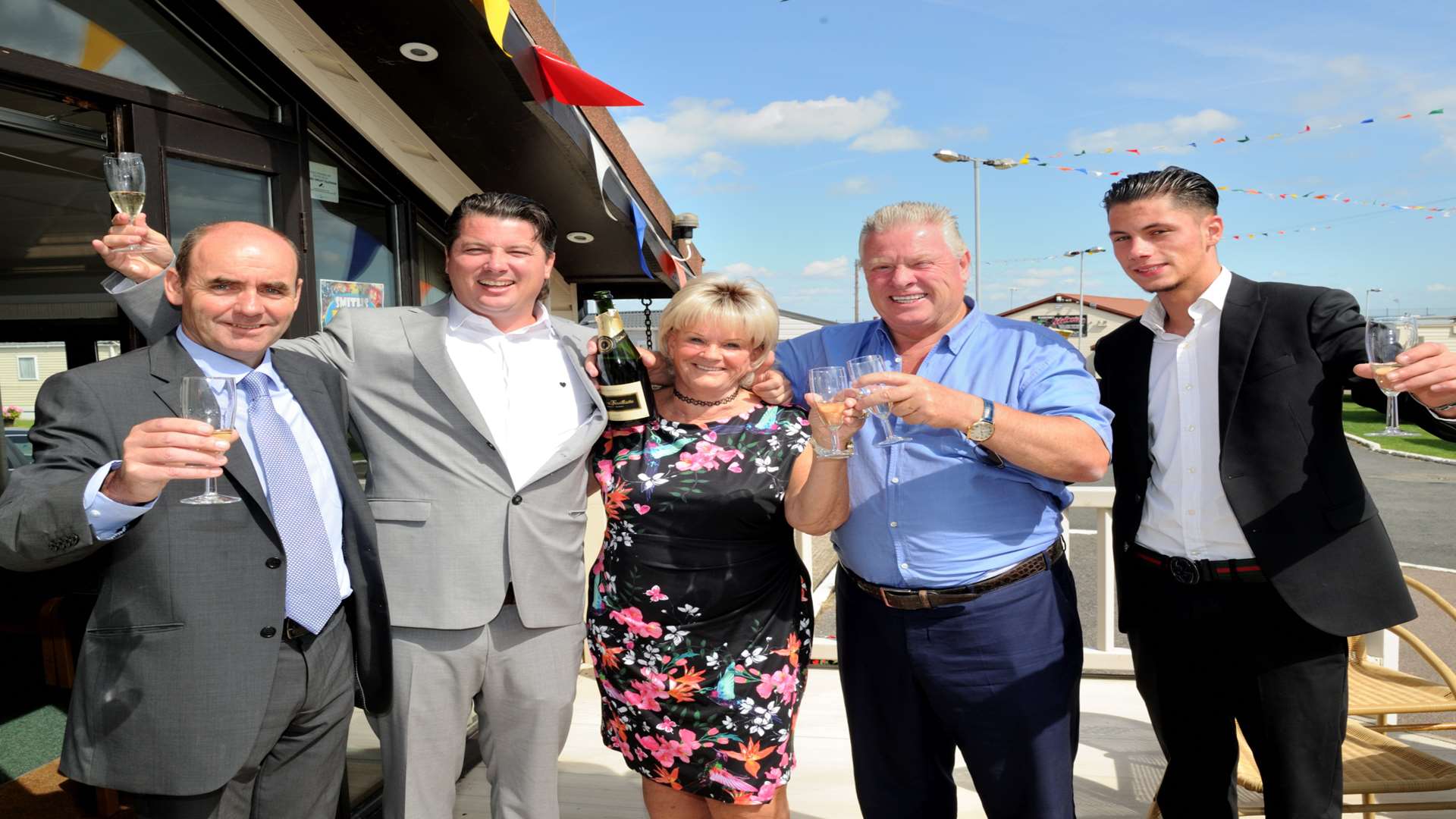 Cheers: From the left, operations manager Andy Johnston with director Paddy Cosgrove, retiring Maureen Wharton, Patrick Cosgrove and Paddy Cosgrove Jnr.