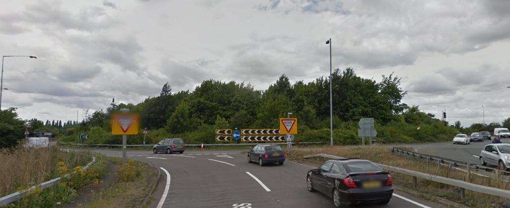 A crash and a broken-down lorry are causing delays on a busy roundabout.