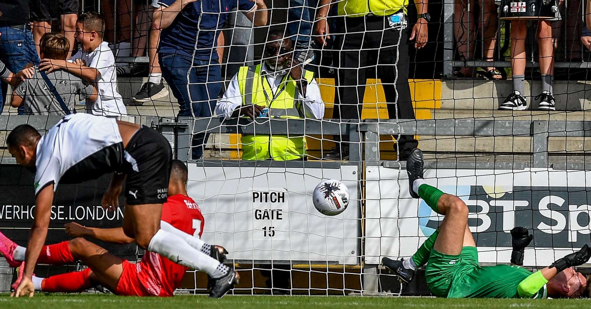 Dartford frontman Lewis Manor bundles in one of his two goals – but they proved in vain. Picture: Dave Budden
