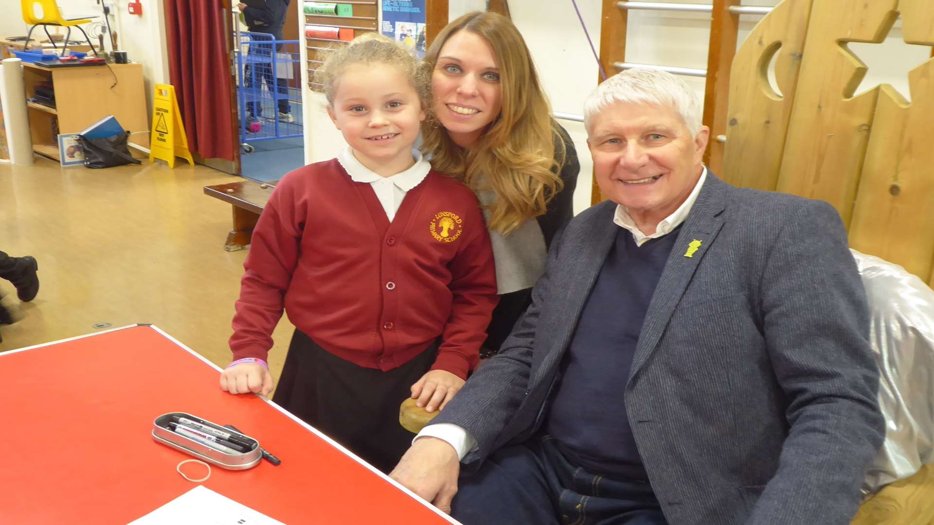 Rachel Phillips and daughter Erin, 8 with Nick Butterworth. The author and illustrator visited Lunsford Primary School, Maidstone after Elephant Class won Kent reading challenge organised through Buster's Book Club.
