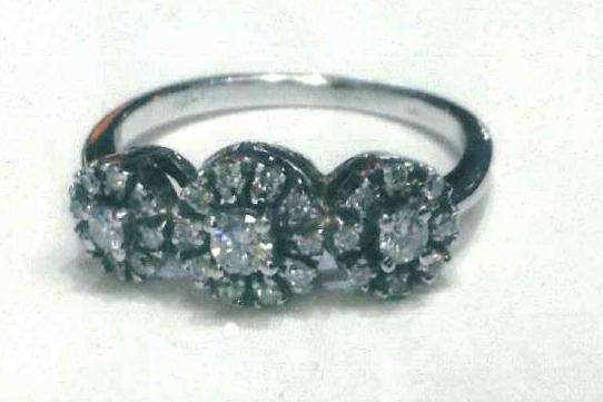 Image of a diamond cluster ring stolen in the Dymchurch jewellery theft.