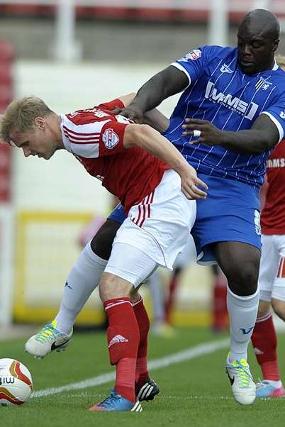 Bayo Akinfenwa in action against Swindon earlier in the season