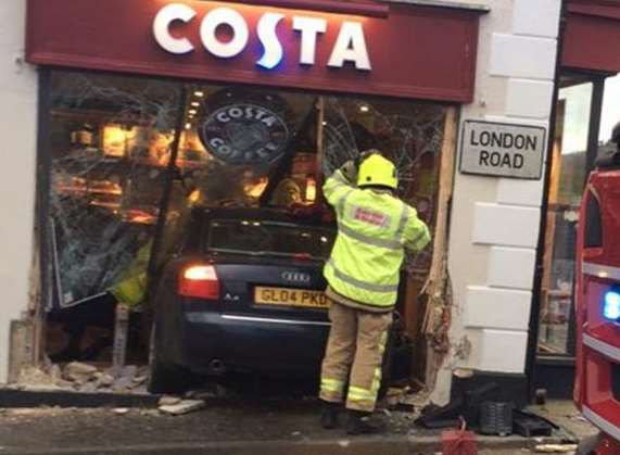 The Audi embedded in the window of the Costa coffee shop at Westerham