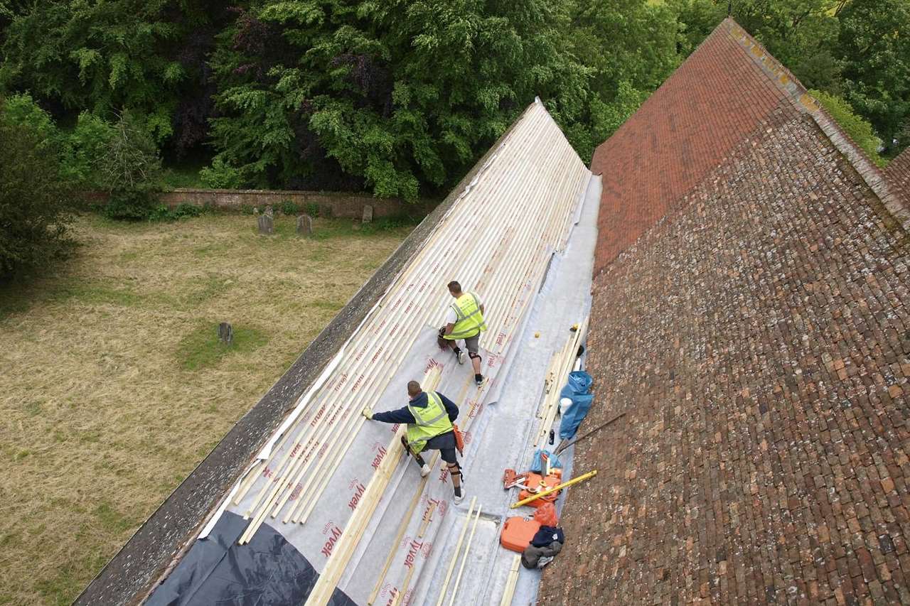 Work under way on the roof of St Mary's Church, Westwell