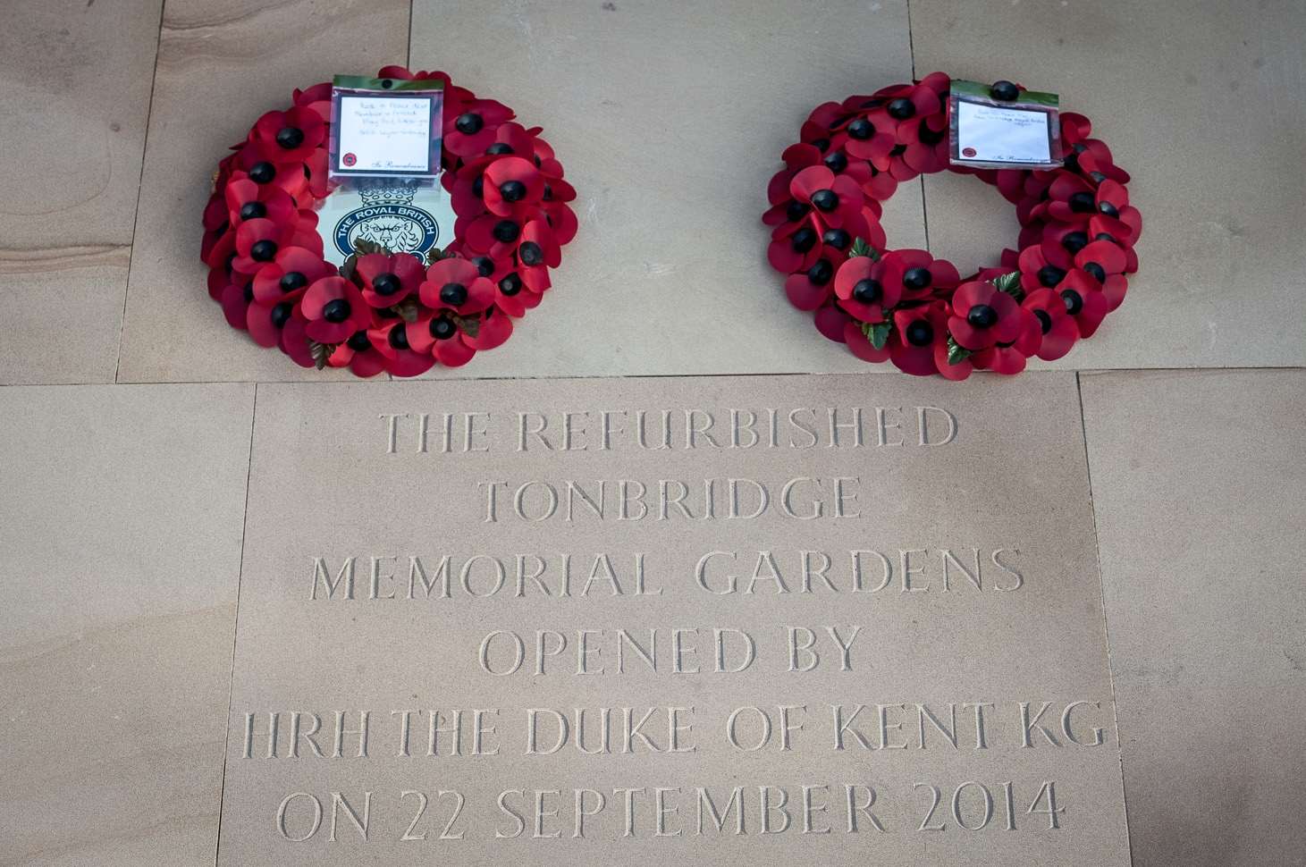 Wreaths and the new commemorative stone at Tonbridge Memorial Gardens