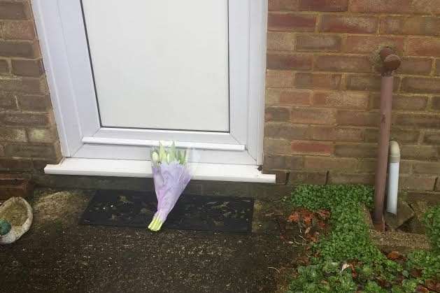Flowers were left outside the property in Little Chequers, Wye
