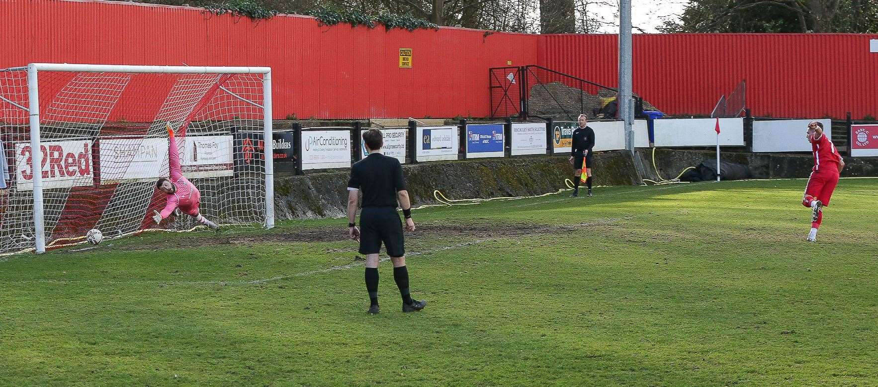 Josh Oliver puts Whitstable 2-0 ahead from the penalty spot, sending his spot-kick past keeper Jordan Perrin. Picture: Les Biggs