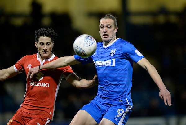 Gillingham's Tom Eaves against MK Dons' George Williams Picture: Ady Kerry (1341585)