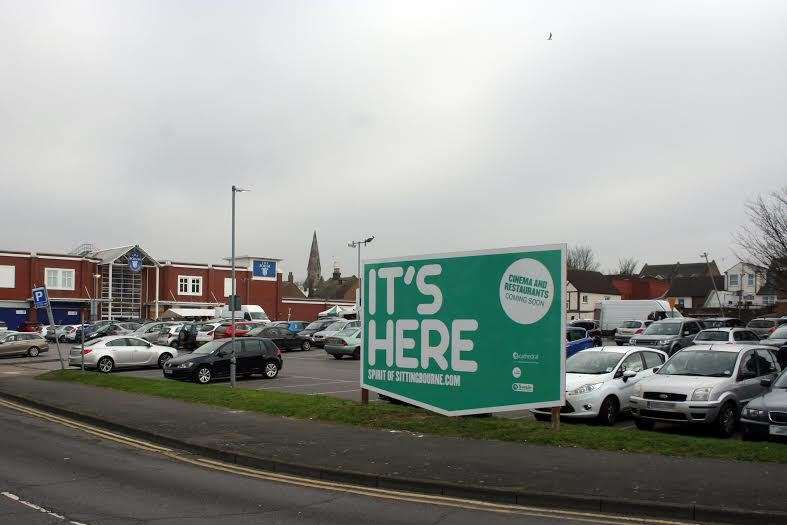 One of the "It's Here" billboards