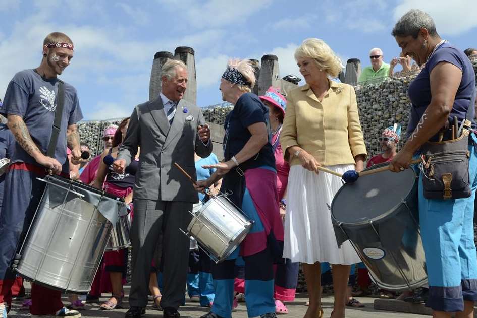 Prince Charles and The Duchess of Cornwall join Samba Pelo Mar on stage in Whitstable. Picture: Gary Browne