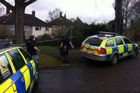 Police with dogs arrive at the scene in Tonbridge