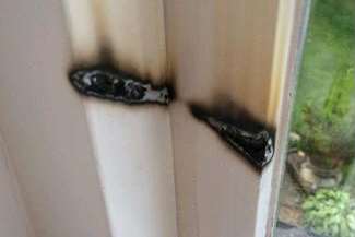 Amelia Taylor, her family, and boyfriend Santiago Pilgrim returned from their holiday in Switzerland to find this burn on a window frame