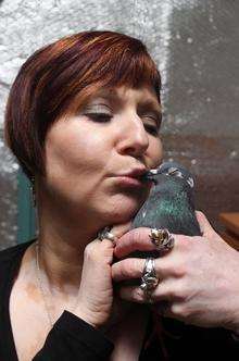 Ingrid Cole with Preep the pigeon at her Kemsley home