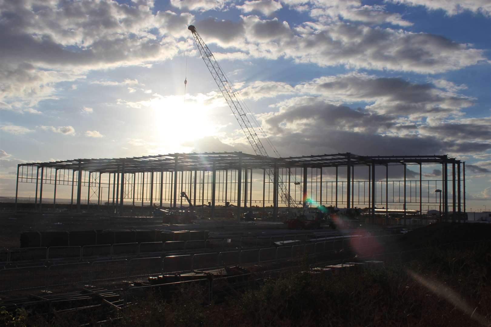 Silhouette of the new Aldi distribution depot being built at Neats Court, Queenborough