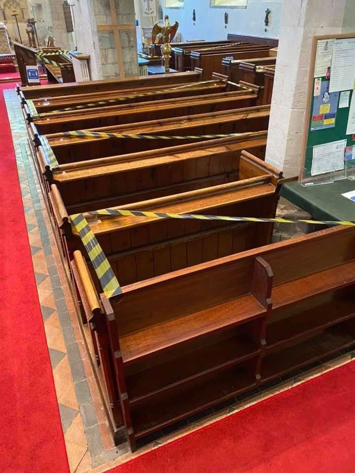 The pews have been taped off to help with social distancing
