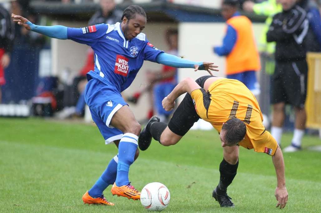 Dee Okojie gets the better of Alex Flisher during Angels' 1-0 win over Maidstone on Monday Picture: John Westhrop