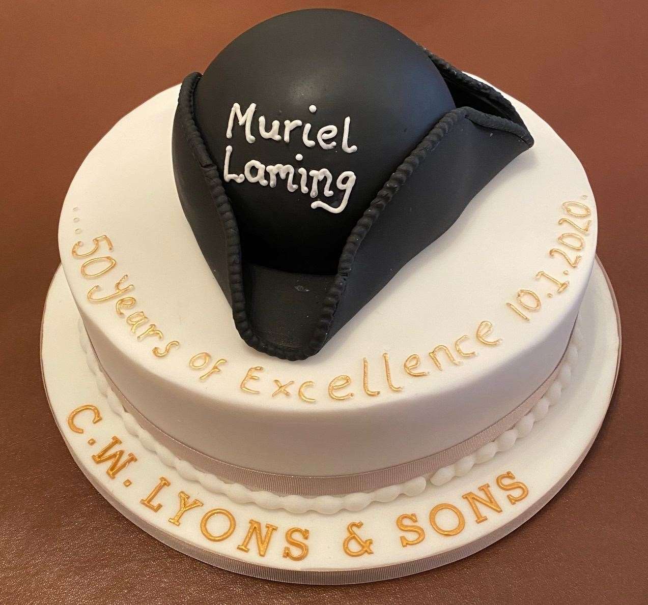 Muriel's cake to mark 50 years with the company. Picture: Mark Laming