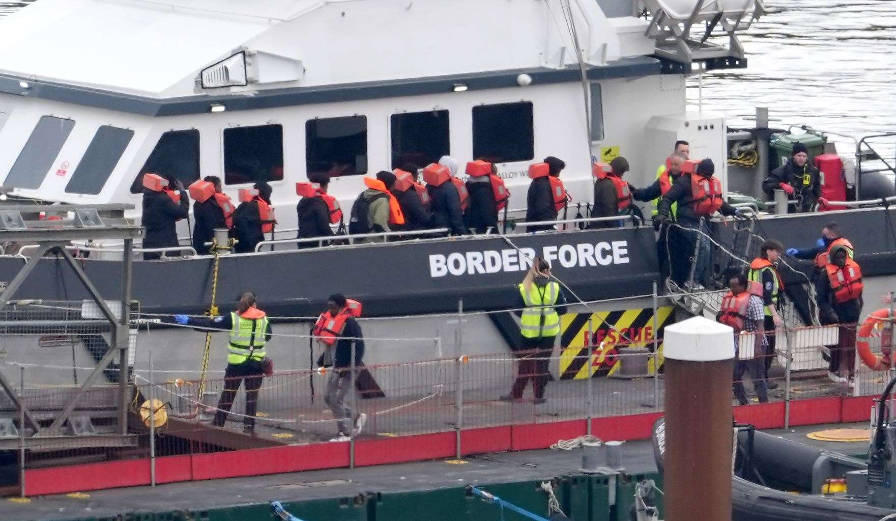 A group of people thought to be migrants are brought in to Dover, Kent, by a Border Force vessel (Gareth Fuller/PA)