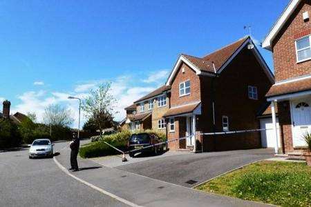 A police cordon was thrown around Natalie and Ivan Esack's house in Rosewood Drive, Ashford