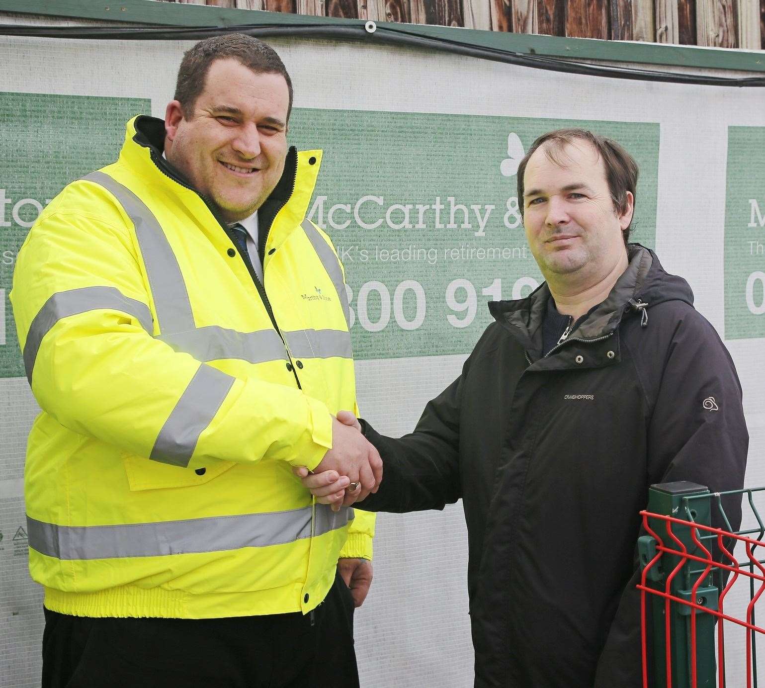 Competition winner Paul Wells with site manager Simon Davies at the future Elkington House. Picture: McCarthy and Stone