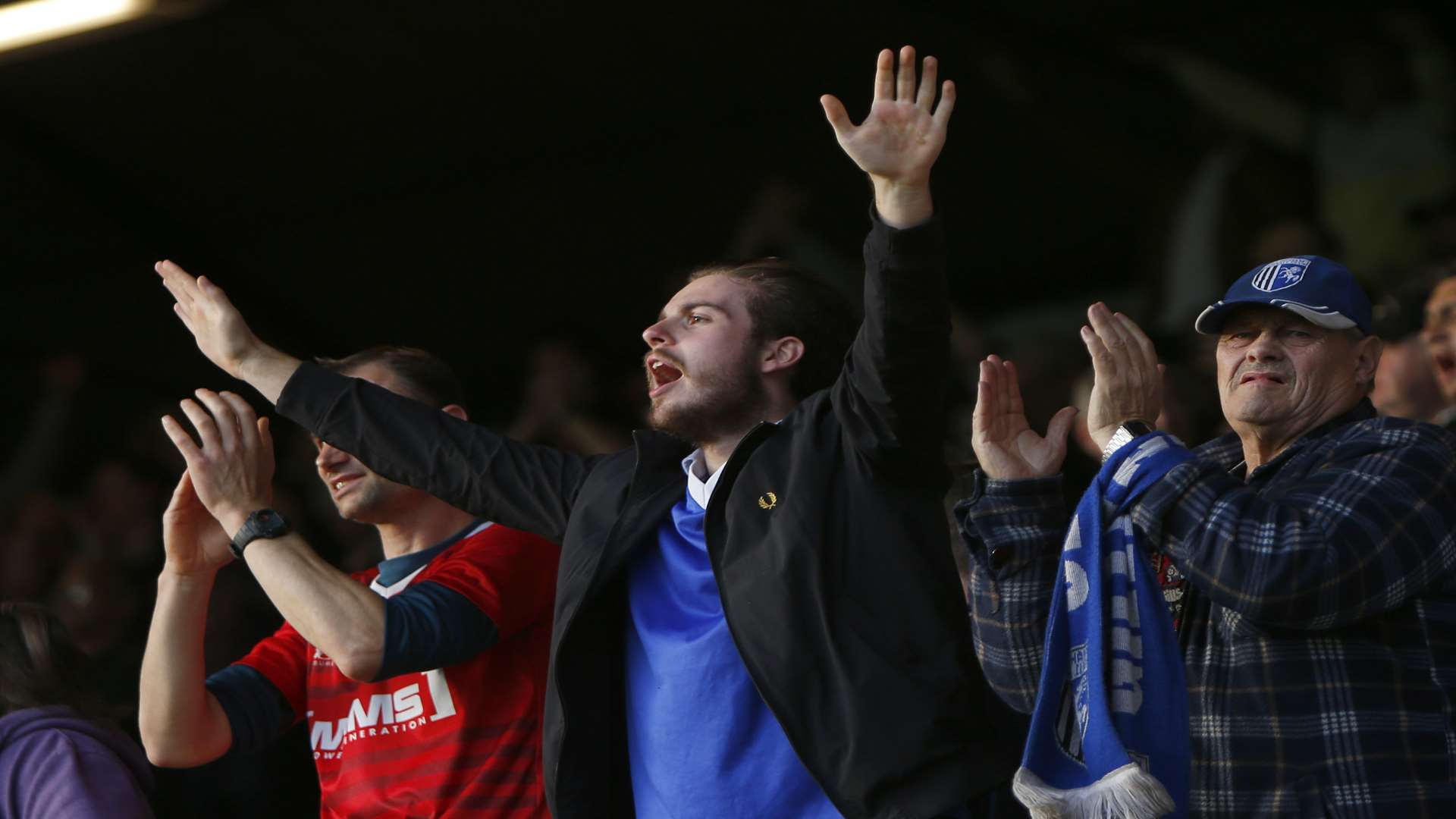 The travelling support celebrate three vital points Picture: Andy Jones