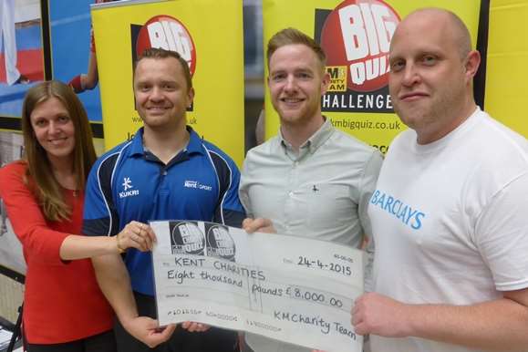 Donna Hayward of MHA McIntyre Hudson, Jarek Dzikowicz of Kent Sport, Kentish Gazette News Editor Joe Walker and Sam Russell manager of Barclays Canterbury announce how much has been raised at the Canterbury KM Big Charity Quiz.
