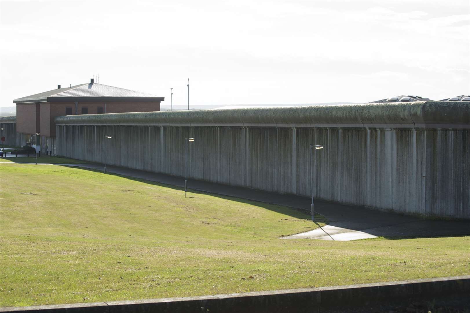 An imposing wall of HMP Swaleside at Eastchurch on the Isle of Sheppey. But what lies behind it? Picture: Andy Payton
