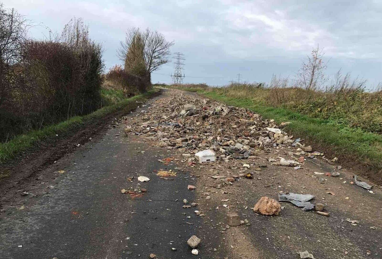 Fury over fly-tipping in Foxhounds Lane, Southfleet near Dartford as rubbish and rubble were strewn across the road. Picture: Dartford Borough Council