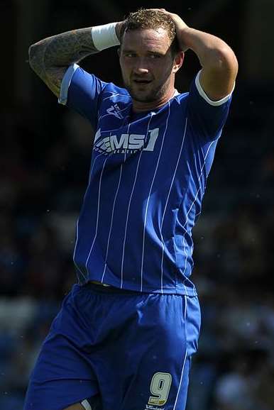 Danny Kedwell rues a missed chance in Gills' opening-day defeat