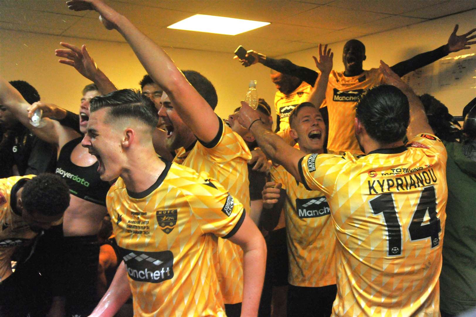 Maidstone United’s FA Cup heroes celebrate their fourth-round win at Ipswich. Picture: Steve Terrell