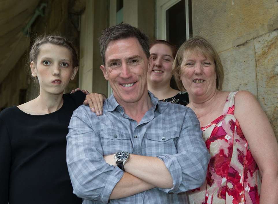 Jana Downes and her family with comedian Rob Brydon