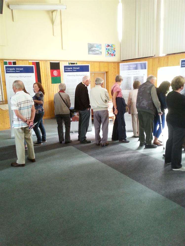 Residents visit the display at the Vine Church