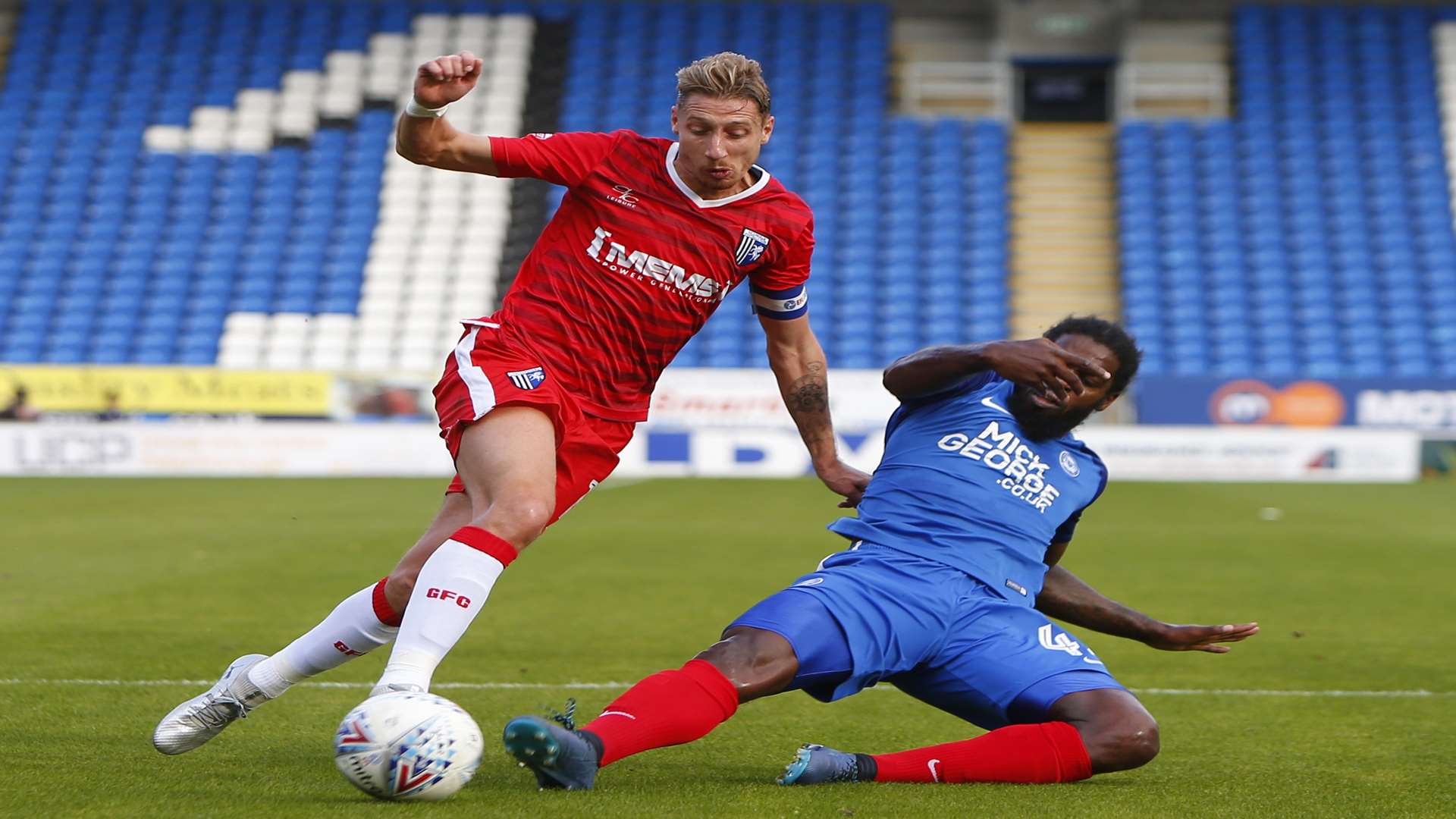 Lee Martin up against Peterborough back in October Picture: Andy Jones