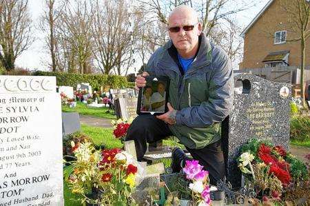 Christopher Gibbs at the grave of his parents Tony and Audrey at Sheerness Cemetery
