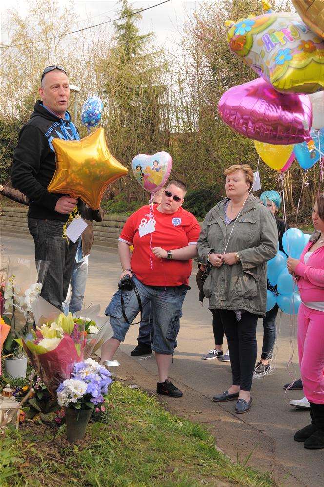 Balloon release in memory of Natalie Jarvis. Her family - Mark, Gemma and Adele Jarvis.