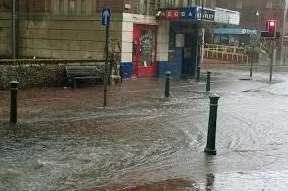 Flooding on Sittingbourne High Street. Picture: @Spinnerfox