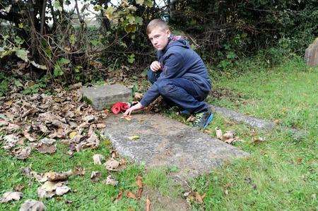 12-year-old George Taylor, who has been appointed by the Victoria Cross Trust to record and monitor the war graves of VC heroes