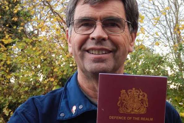 Geoff with a replica Permit Book that anyone wanting to go onto the Isle of Sheppey during the First World War had to have