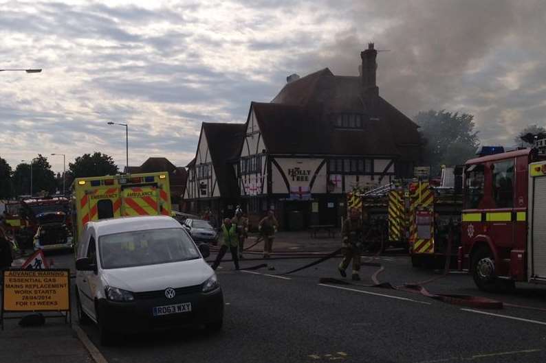 Firefighters use hoses to tackle the blaze