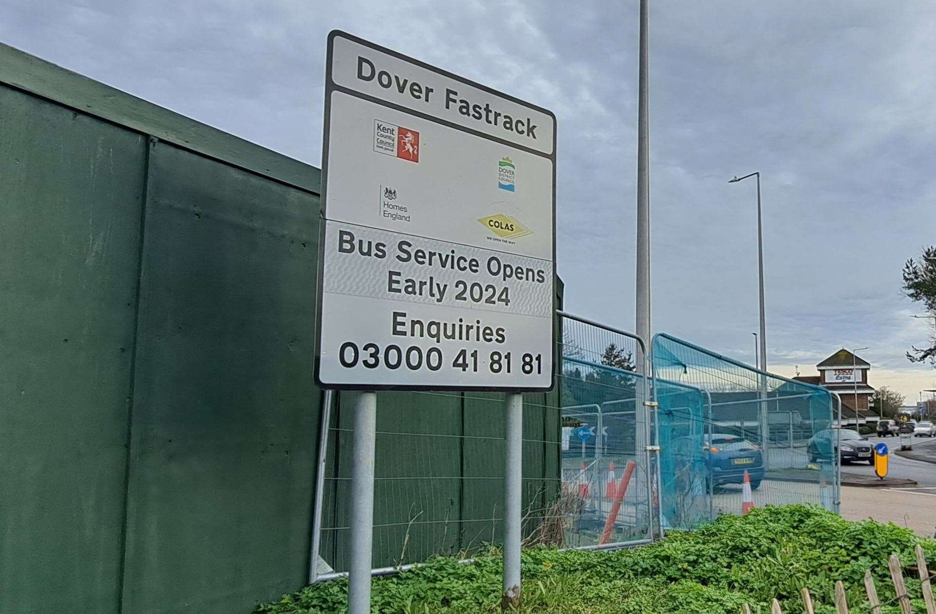 A sign at the Tesco roundabout in Whitfield says the Fastrack route will open in “early 2024”